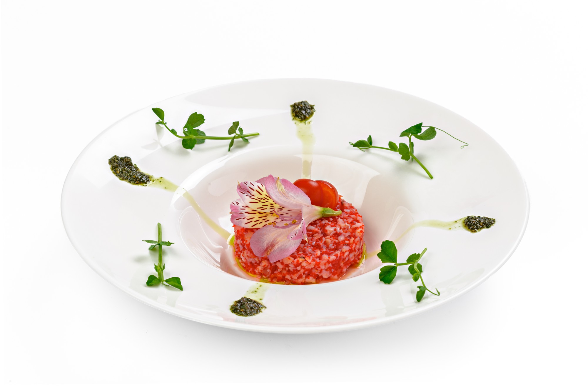 Plated dish with geometric garnish